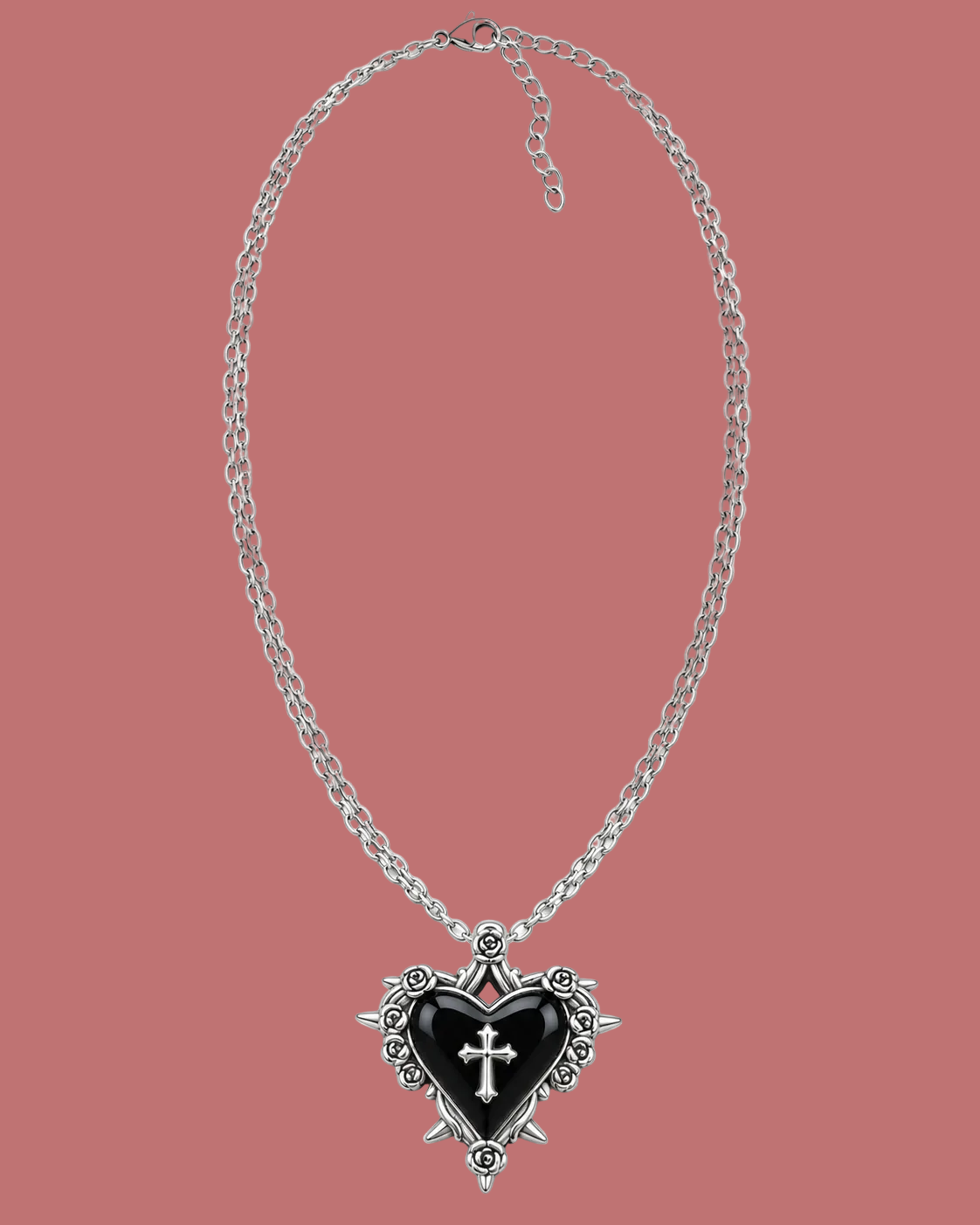 Collana con pendente a cuore nero, croce e cornice color argento decorata con rose