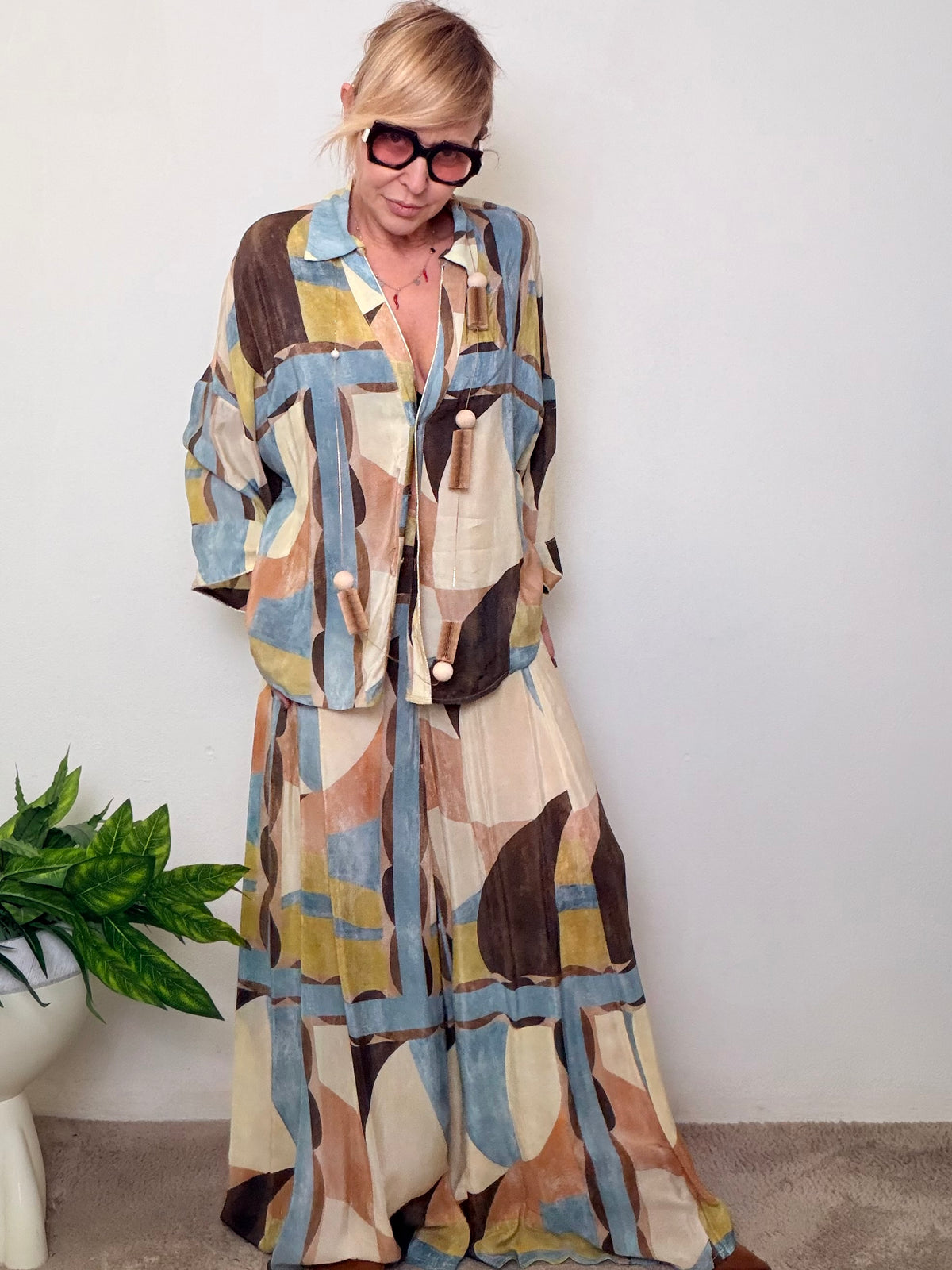 Pantalone palazzo stampa geometrica multicolor balze