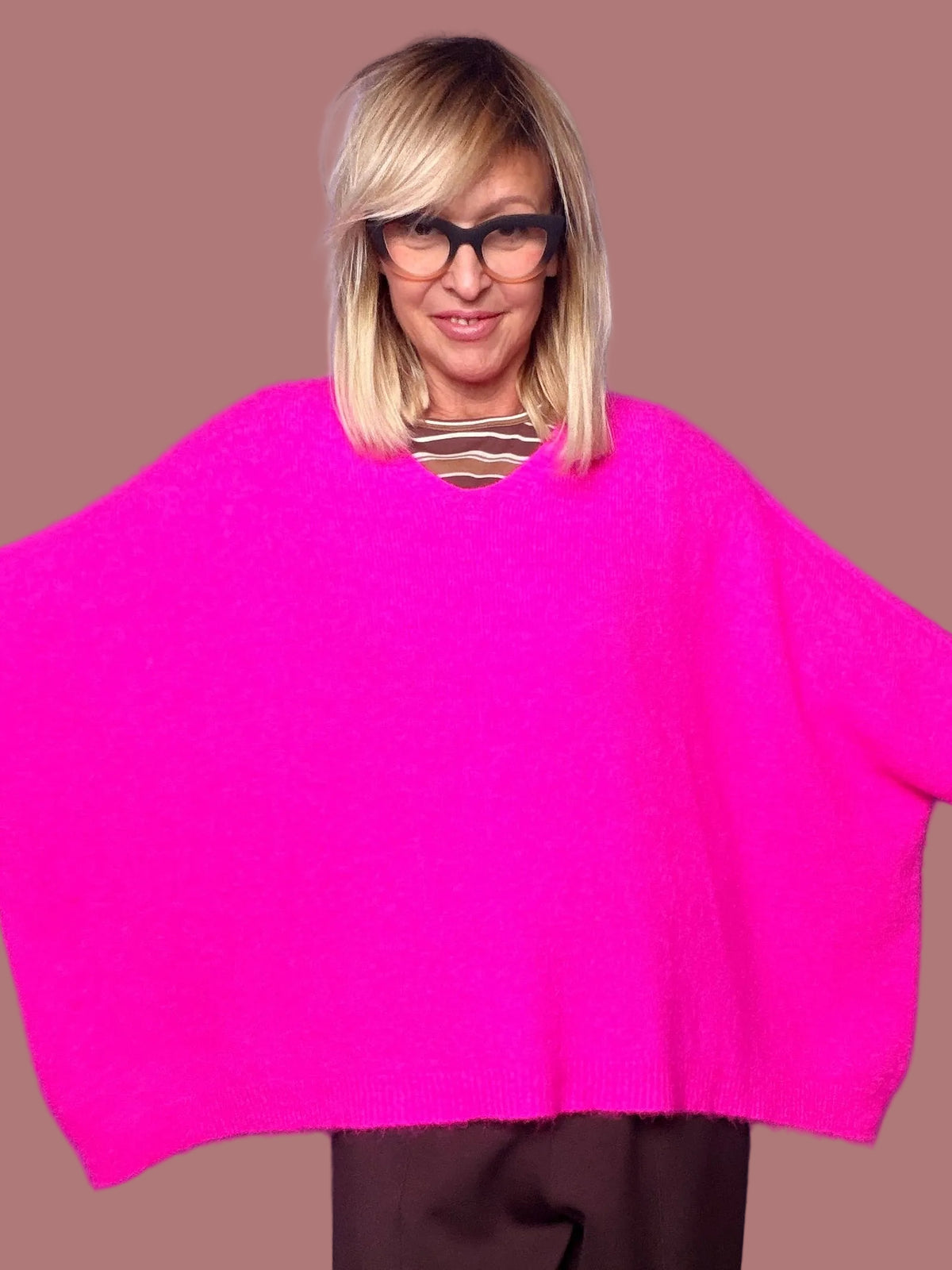 Maglia poncho oversize con scollo a V
