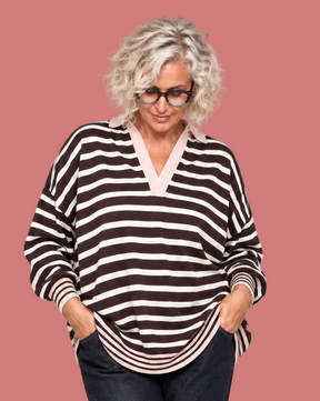 Polo a righe con colletto rosa a contrasto