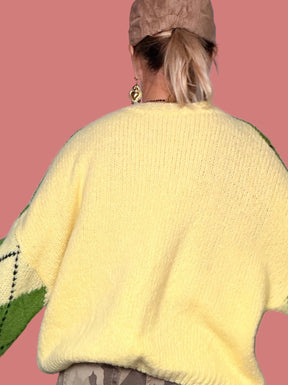 Vestibilità ampia della maglia da donna a rombi verde e panna