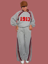 Pantalone in felpa con bande laterali a contrasto