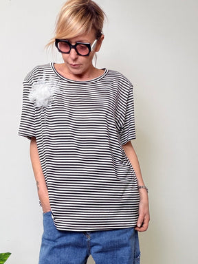 Maglia spallini con fiore