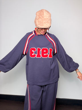 Felpa oversize con bande a contrasto e patch