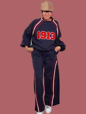 Pantalone in felpa con bande laterali a contrasto