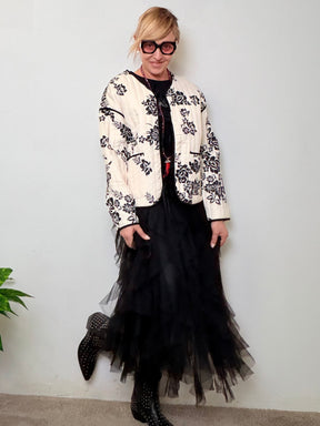 Giacca bomber trapuntata panna con stampa floreale nera