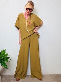 Pantalone palazzo con profili a contrasto