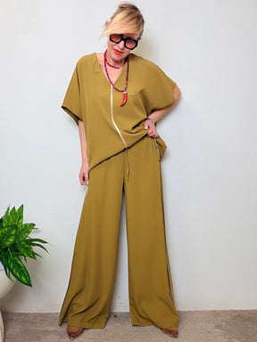 Pantalone palazzo con profili a contrasto