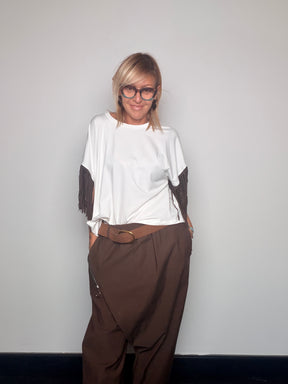 Pantalone over con drappeggio e zip diagonale