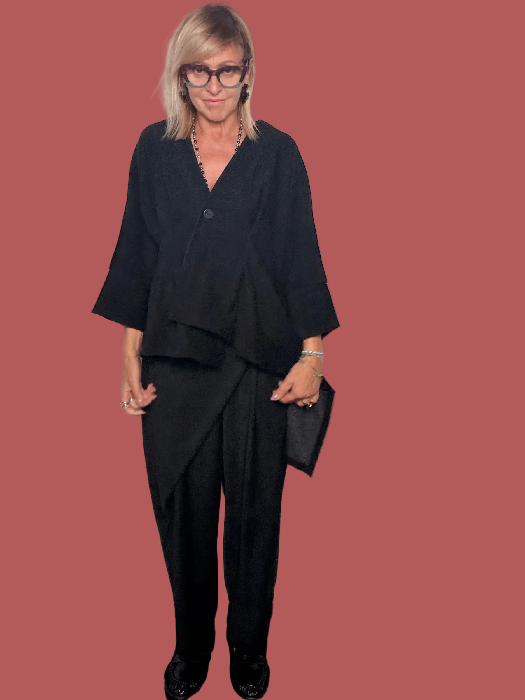 Pantalone nero in misto lyocell con drappeggio asimmetrico