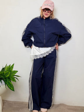 Giacca sportiva con bande laterali e pizzo