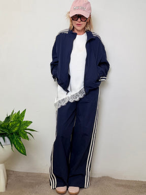 Pantaloni sportivi con bande laterali