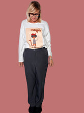 Pantalone dalla linea morbida con tasche laterali