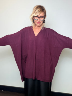 Maglia oversize in viscosa con scollo a V e tasca laterale
