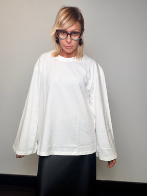 T-shirt oversize con maniche a campana e taschina