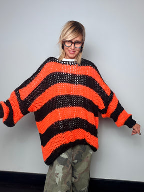 Maglia oversize a righe larghe con lavorazione traforata