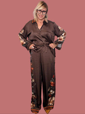Pantalone Susy Star moro con stampa floreale e bordi a righe sul fondo