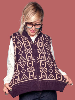 Gilet in maglia con fantasia geometrica e zip