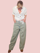 Jeans lavaggio thè palazzo borchie argentate
