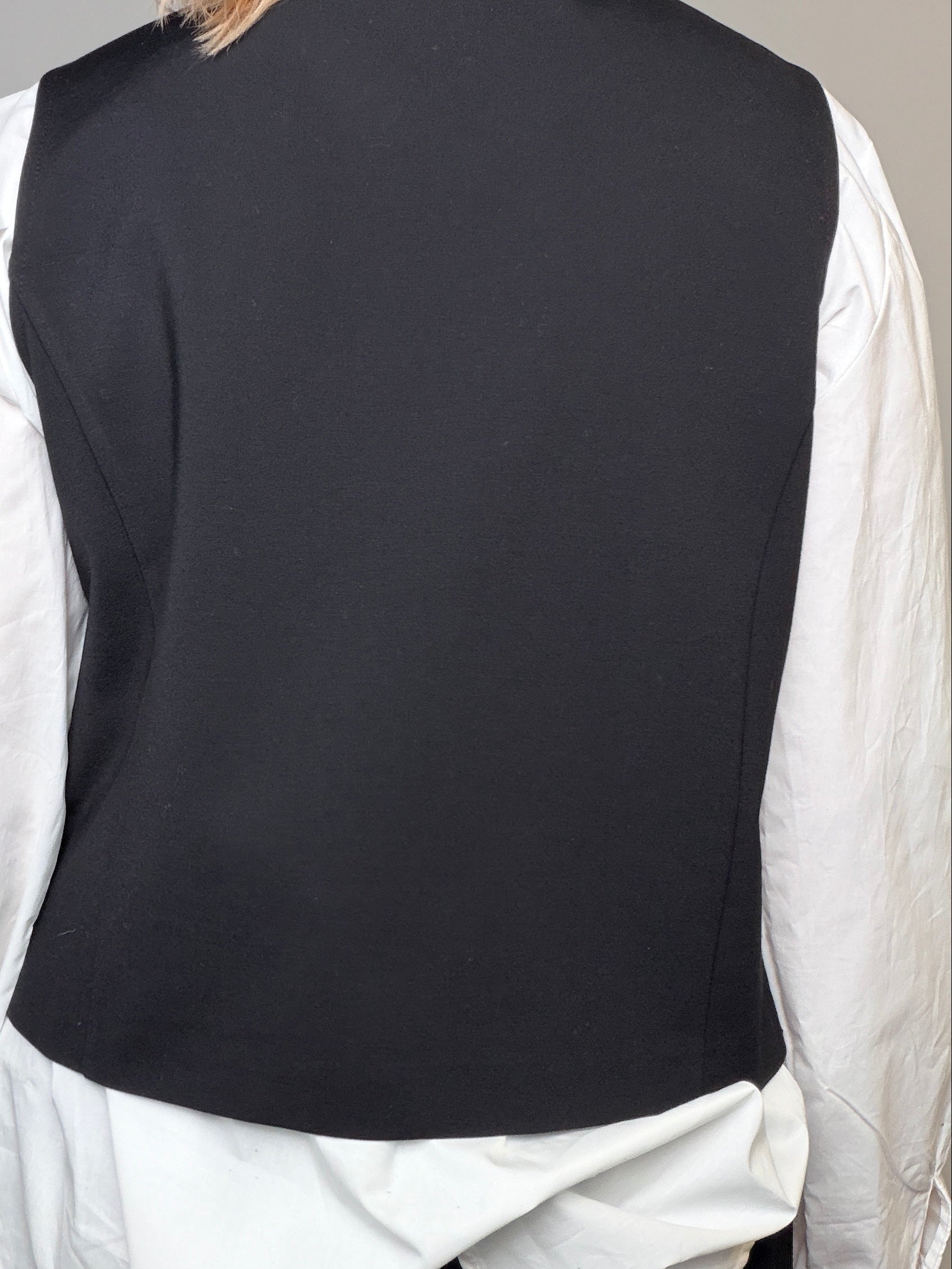 Gilet in ecopelle con retro in punto Milano