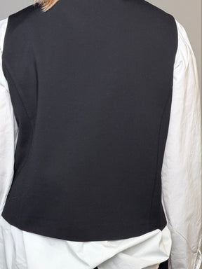 Gilet in ecopelle con retro in punto Milano