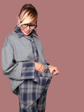 Dettaglio della vita e delle tasche del pantalone palazzo scozzese