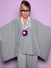 Maglia Souvenir grigio mélange, vista laterale e dettaglio della manica a coste