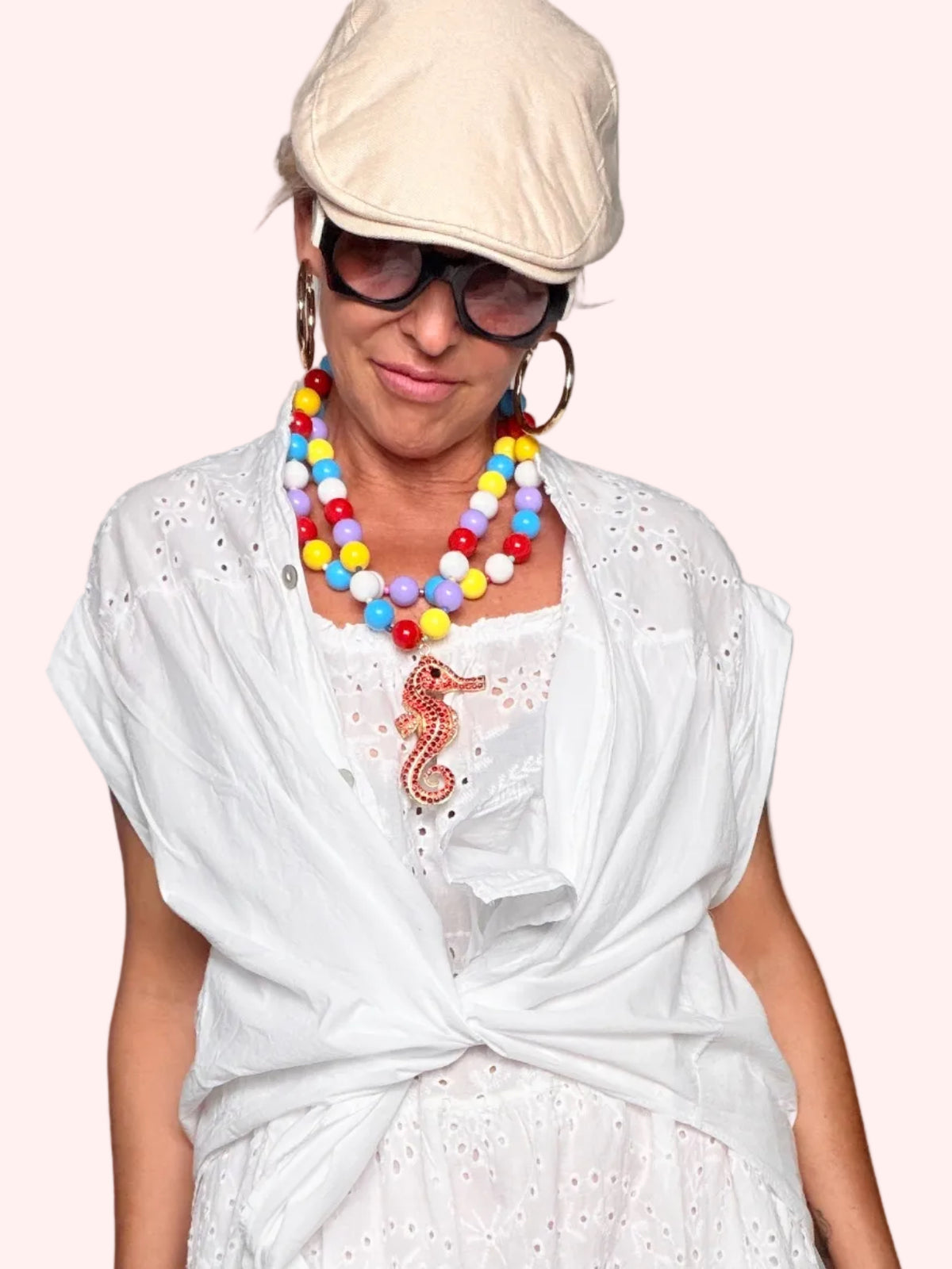Camicia in sangallo bianco con maniche aperte