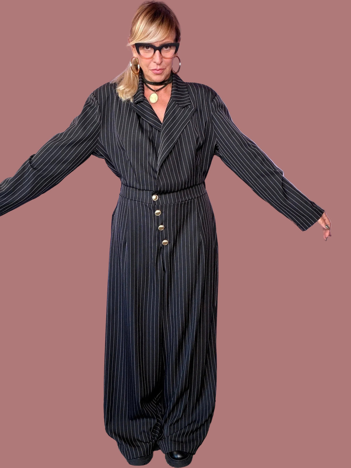 Tuta gessata con collo a revers e pantalone ampio Female