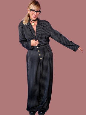 Tuta gessata con collo a revers e pantalone ampio Female