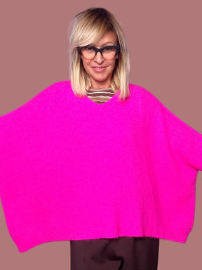 Maglia poncho oversize con scollo a V