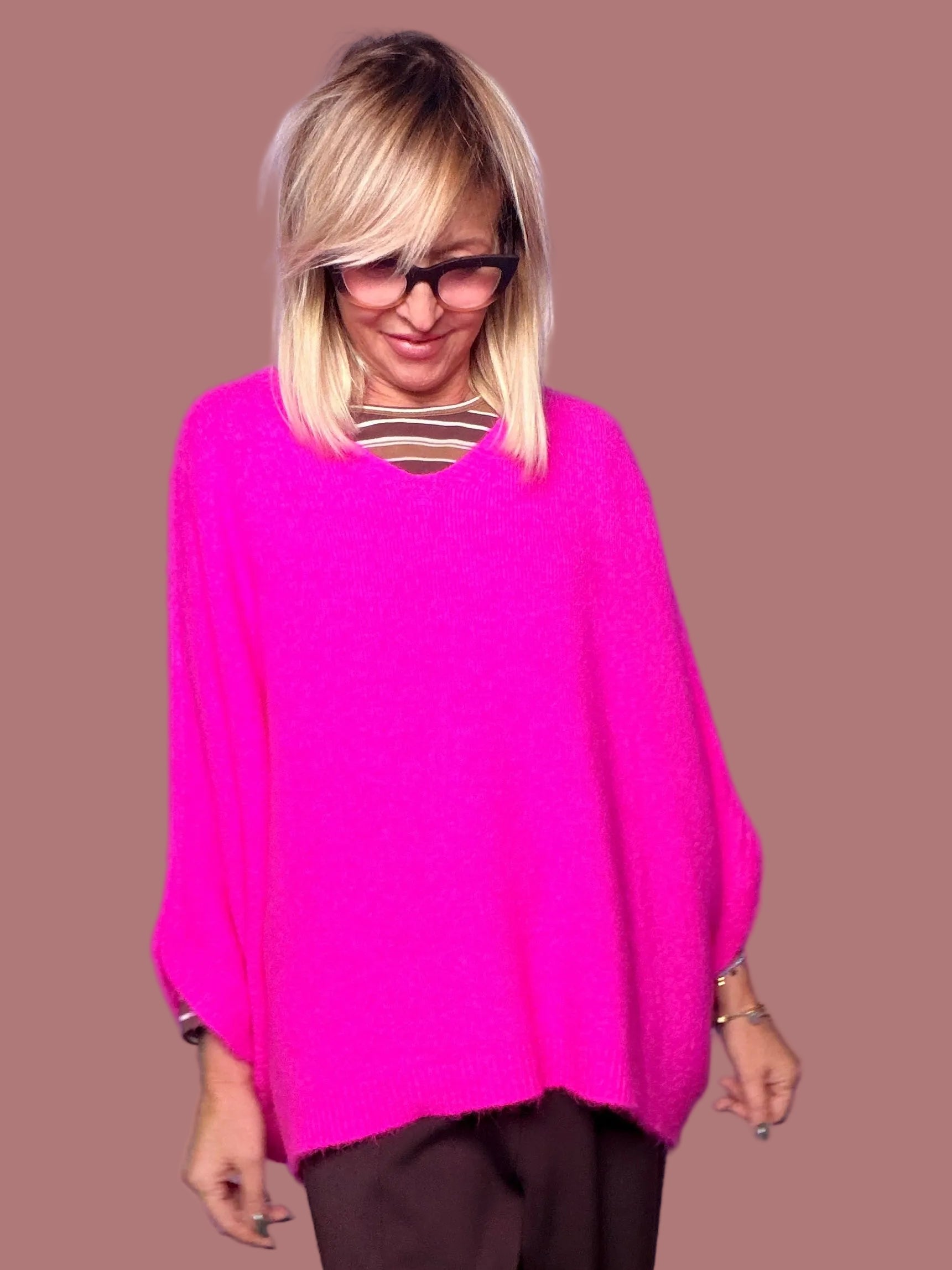 Maglia poncho oversize con scollo a V