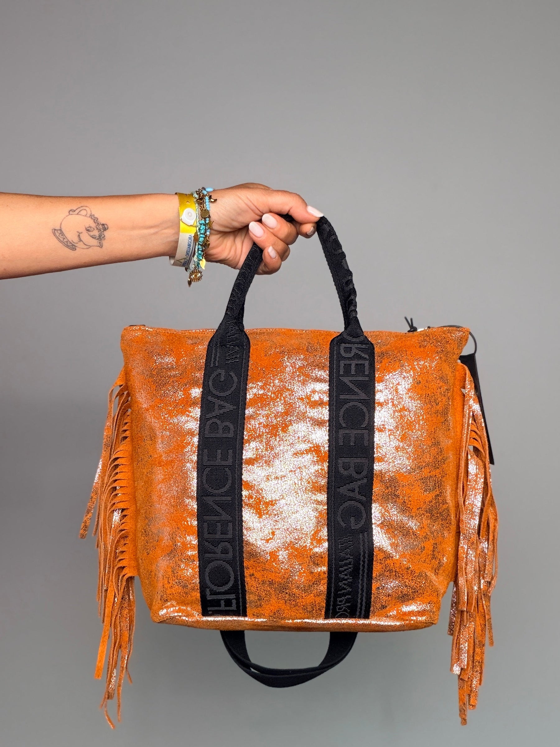Borsa tote frange glitter arancione - vista frontale con manico intrecciato