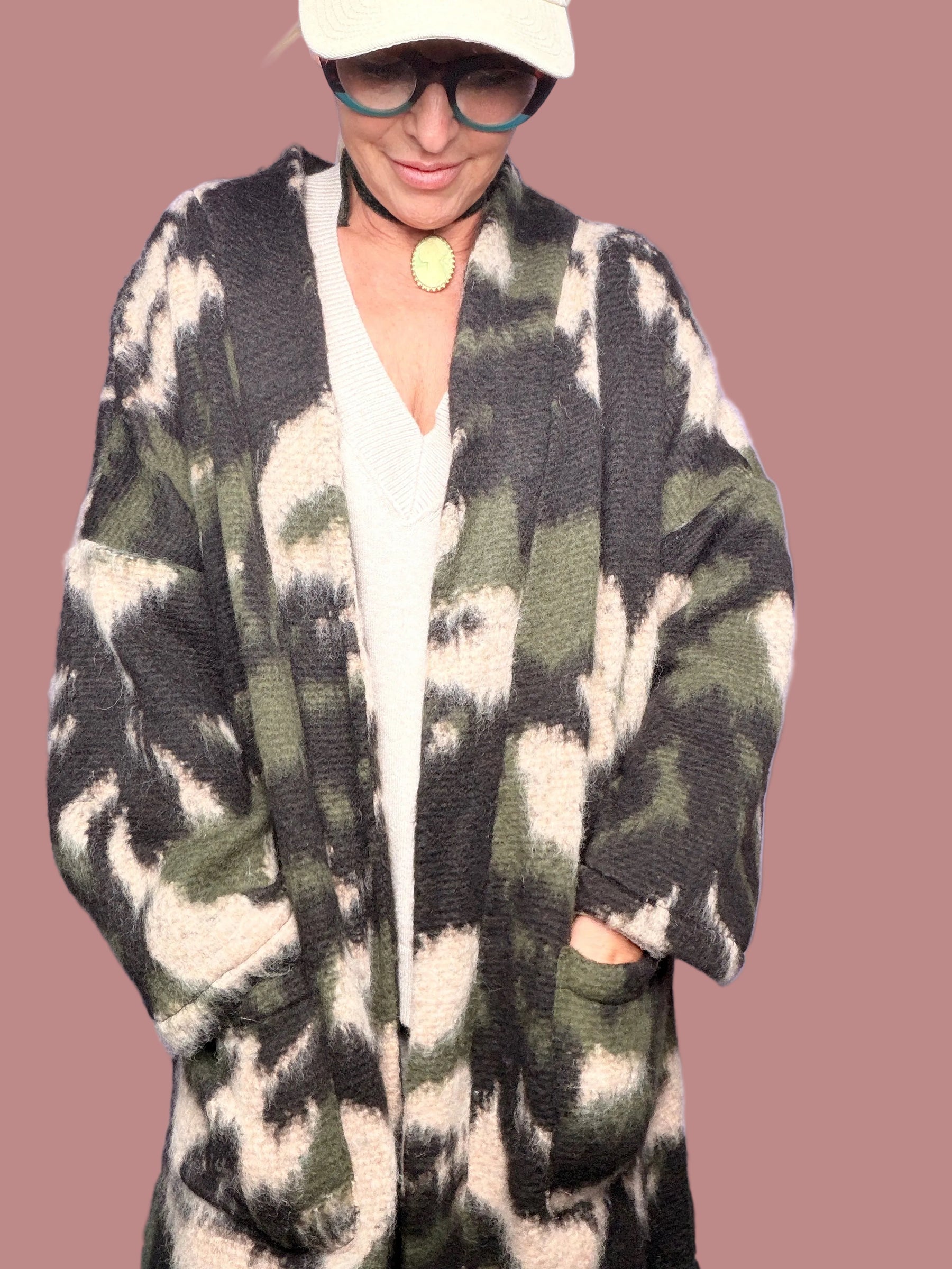 Cappotto jacquard con frange e tasche applicate