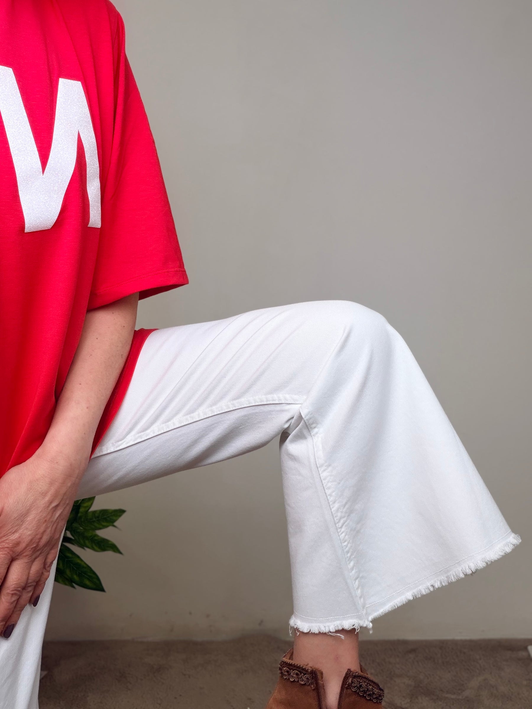 Jeans a Trombetta con Orlo Sfrangiato