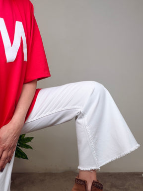 Jeans a Trombetta con Orlo Sfrangiato