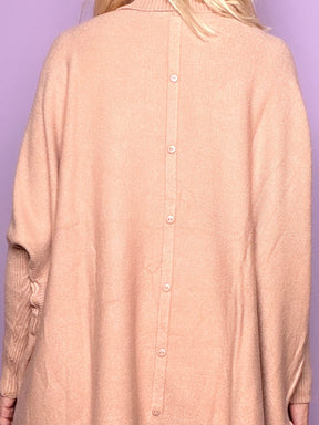 Maglia extra over con collo alto e bottoni dietro