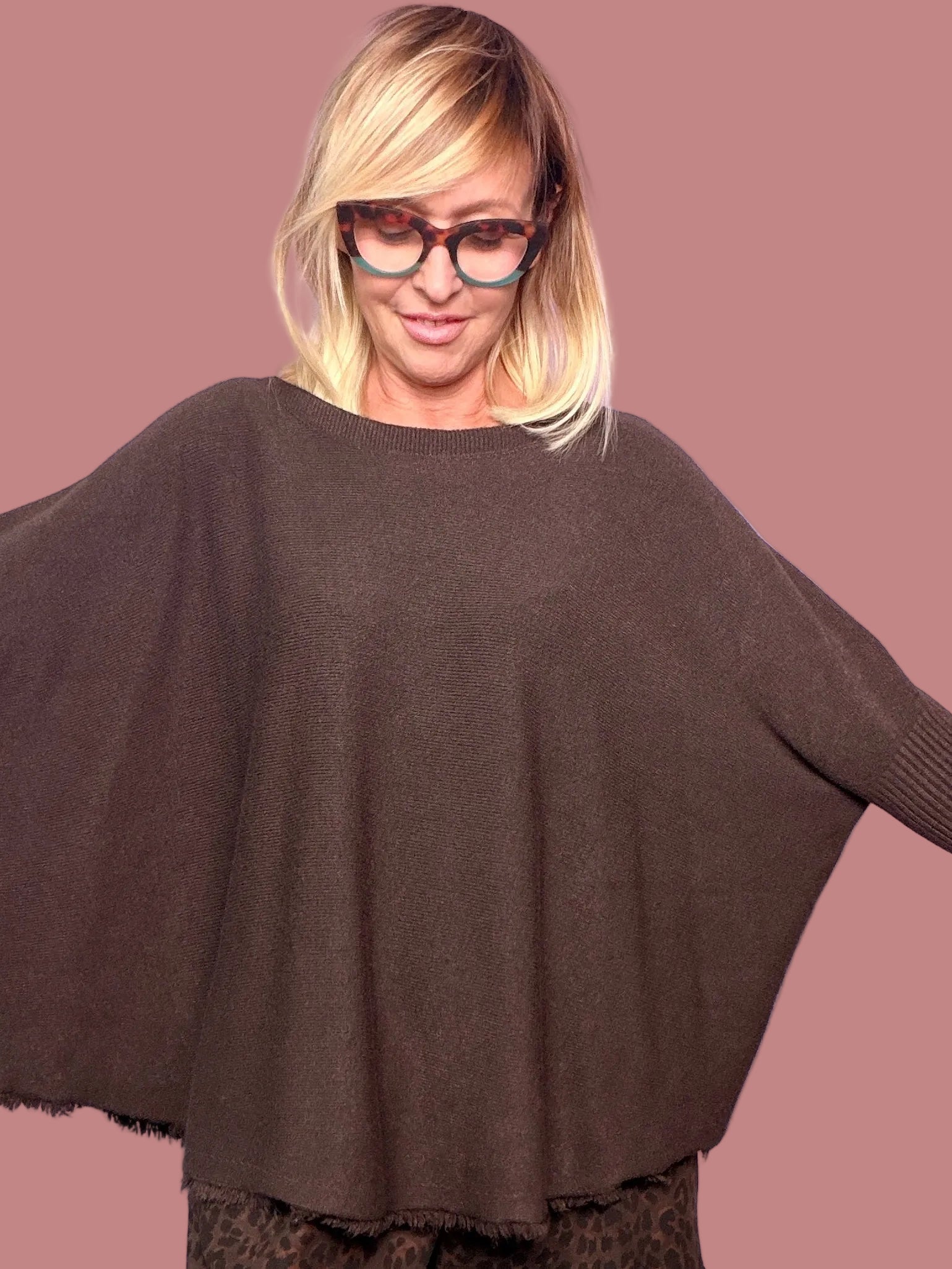 Maglia poncho over con fondo sfrangiato Female