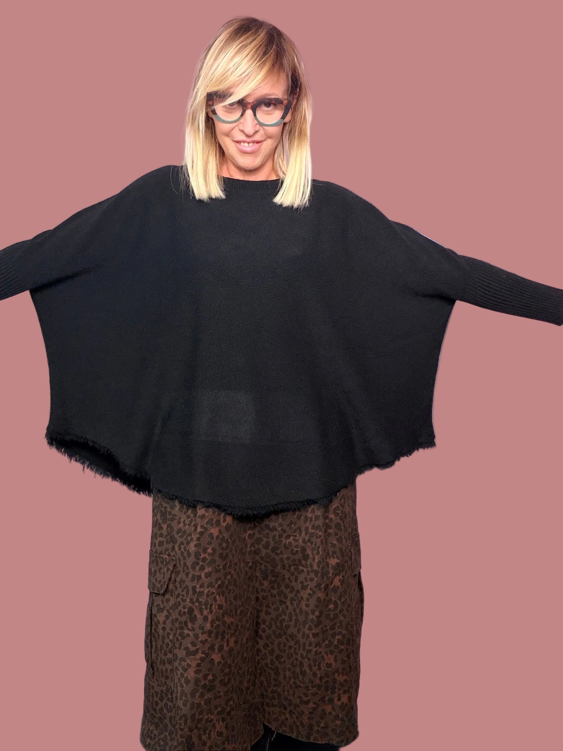 Maglia poncho over con fondo sfrangiato Female