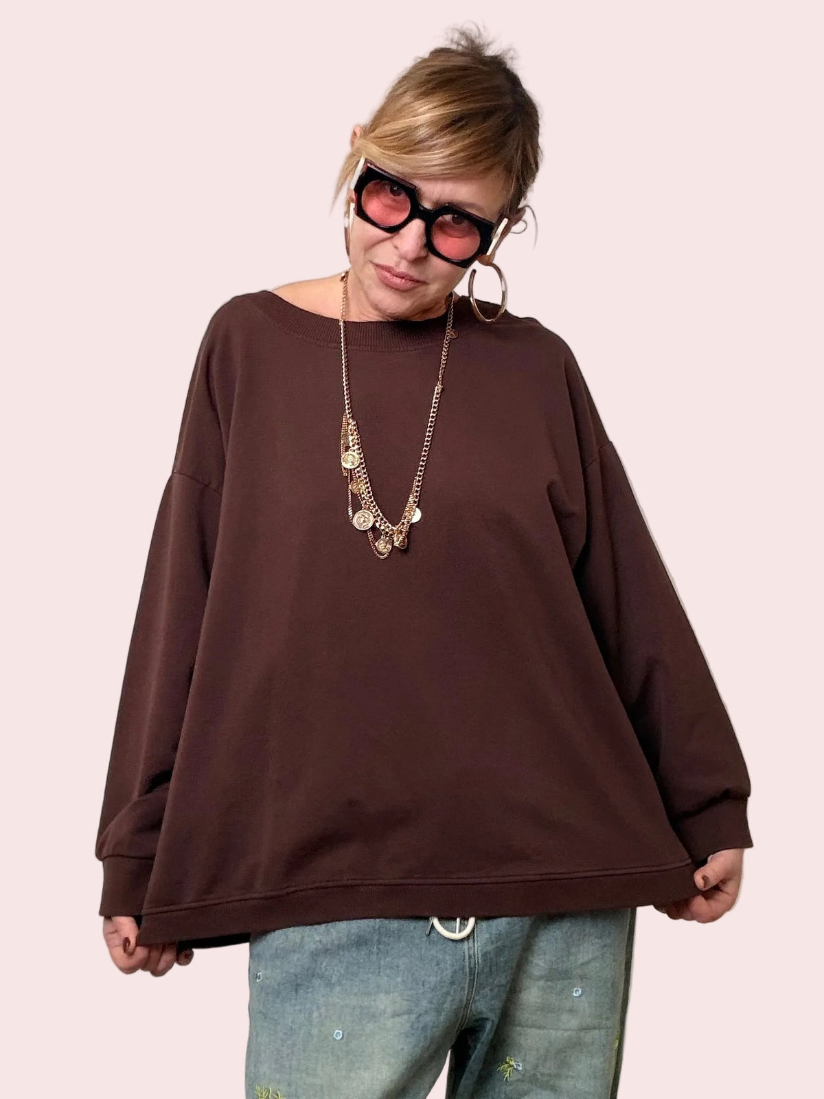 Felpa over con dettaglio sorpresa sul retro