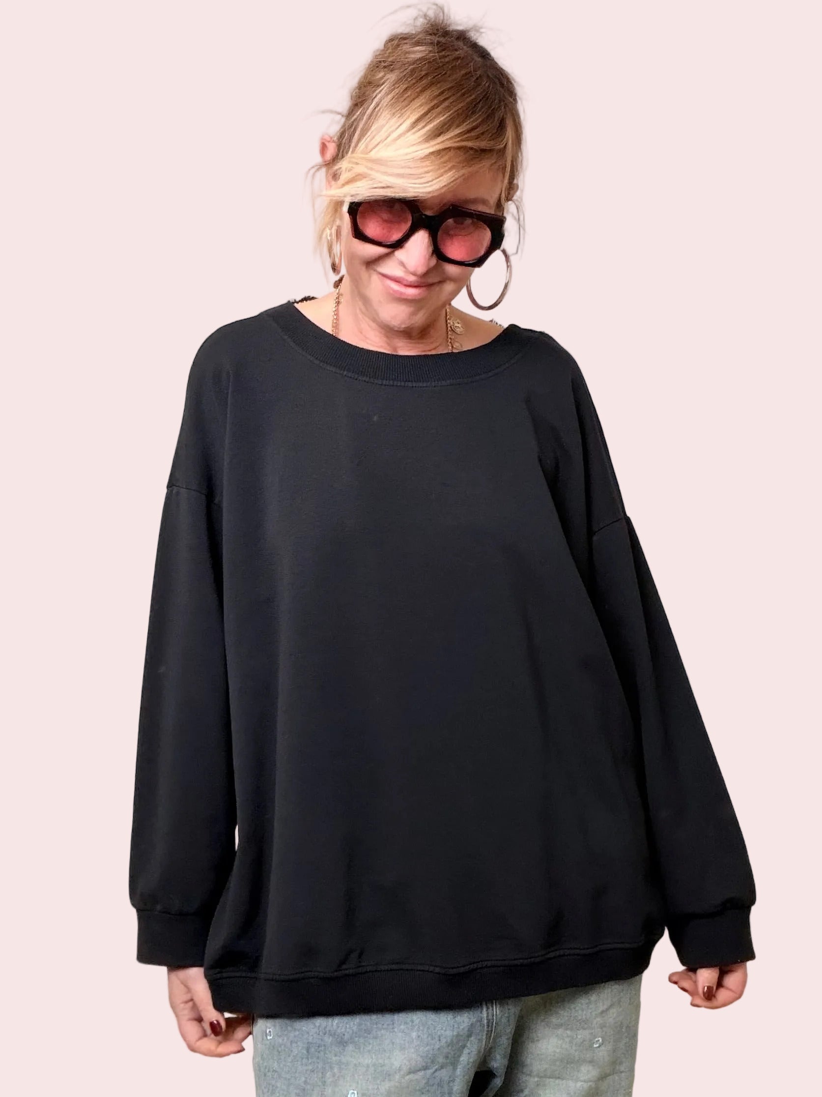 Felpa over con dettaglio sorpresa sul retro