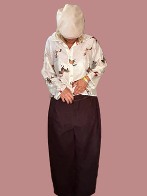 Pantalone ampio con tasche piatte davanti