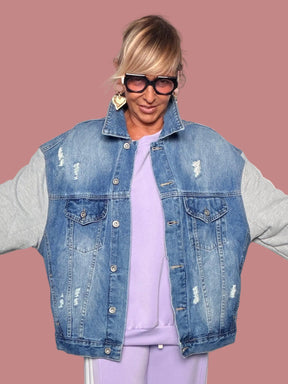 Giacca Female in denim azzurro con maniche in felpa grigia