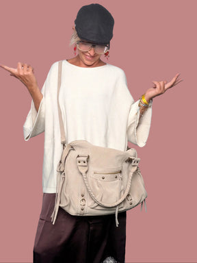 Borsa in camoscio con dettagli boho chic