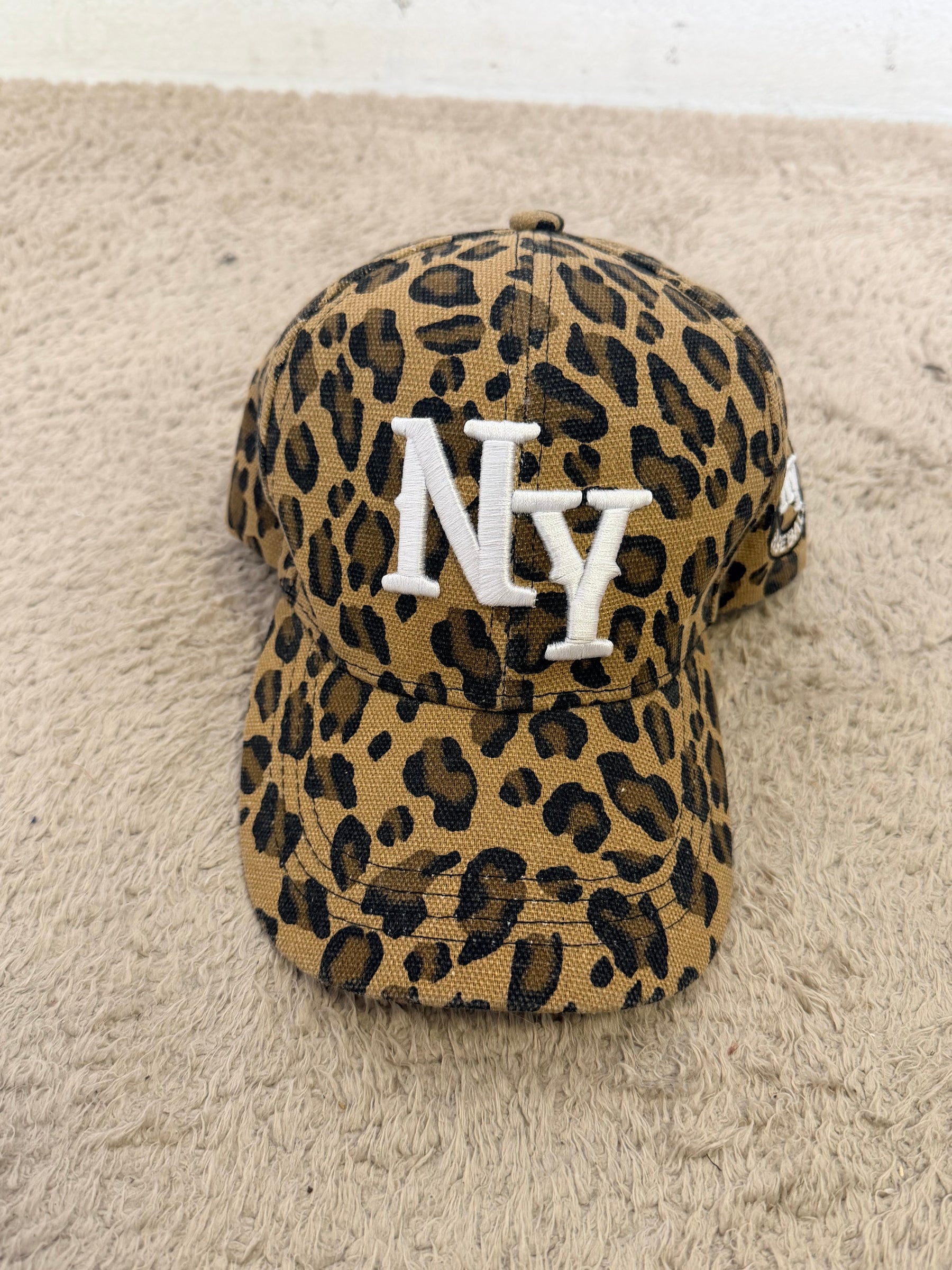 Cappelli baseball con logo e stampa animalier