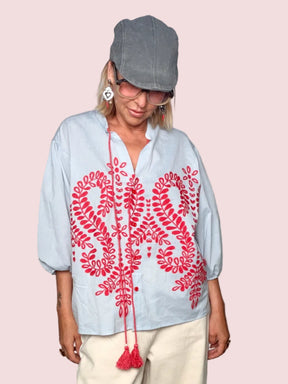Camicia Oversize Azzurra con Ricamo Botanico Rosso e Nappine