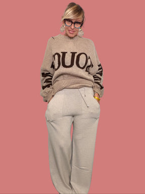 Pantalone palazzo beige da donna con vita con coulisse e tasche laterali