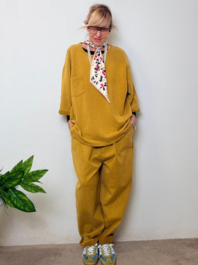 Jeans over tinto capo