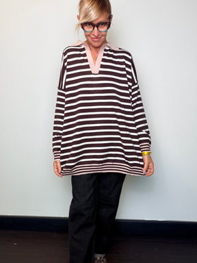 Polo a righe con colletto rosa a contrasto