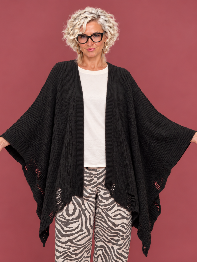 Poncho nero aperto in maglia con dettagli traforati